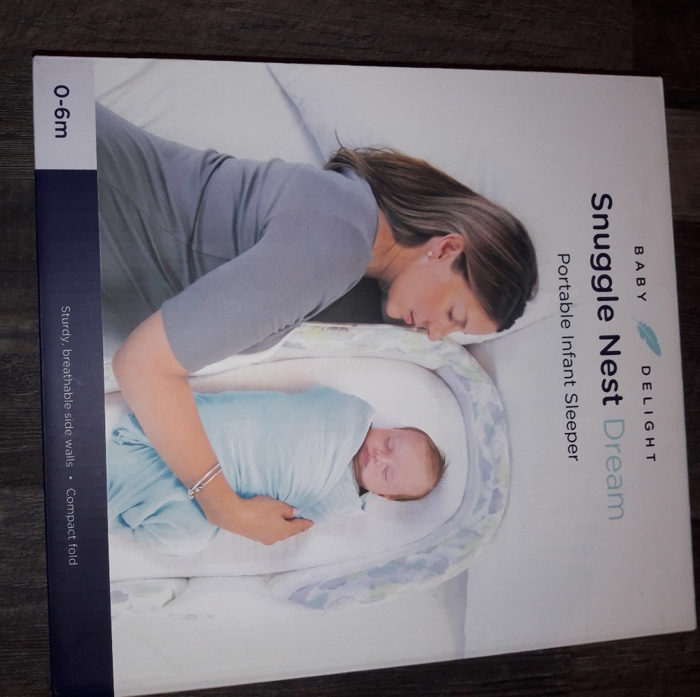 Snuggle nest dream portable infant sleeper